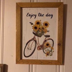 Large hanging “Enjoy the day sign”